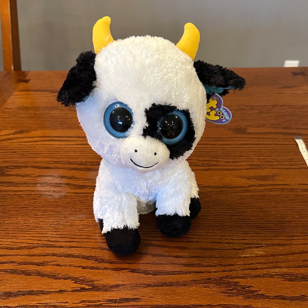 TY beanie boo cow stuffed animal named Daisy with tags